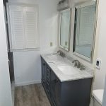Bathroom renovation with gray sinks