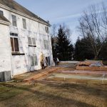 Rear view of Avon CT home with old deck removed