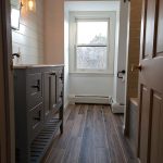 New bathroom wood plank tile flooring