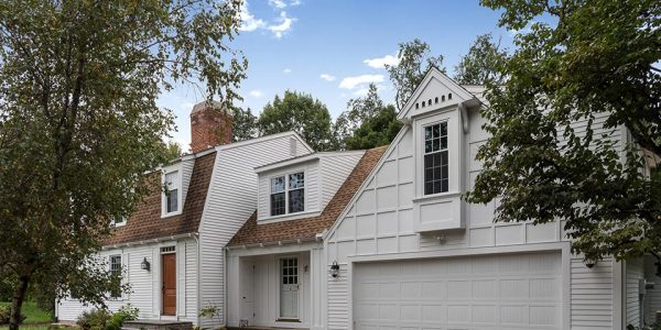 White house with attached garage in Simsbury, CT